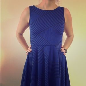 Delia’s blue and black patterned dress